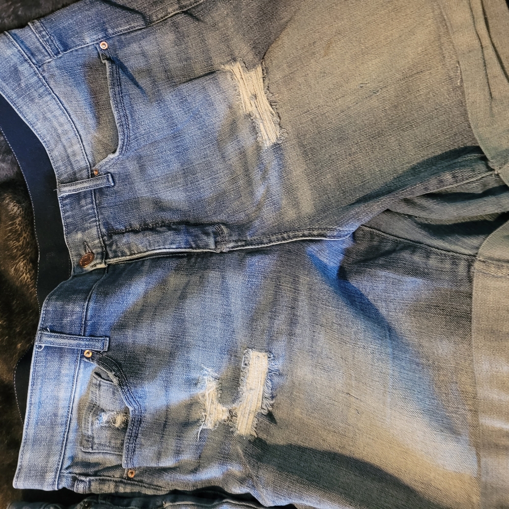 Distressed Blue Denim Jeans
